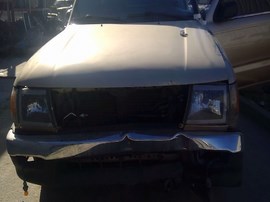 1999 TACOMA, GOLD, STD CAB, 2.4L, AT, 2WD.  Z25946